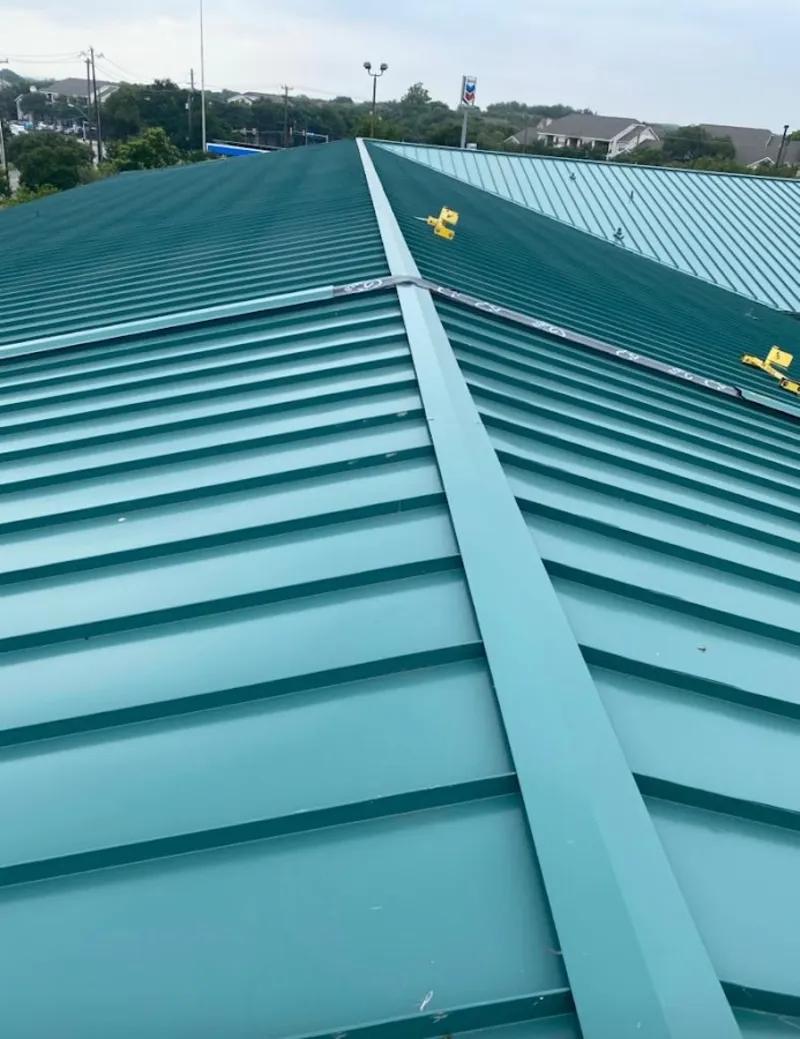 Green commercial metal roof ridge and valley for Metal Roof Repair in Dos Palos